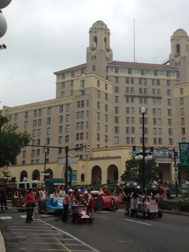 Teams assembling in front of the historic Arlington Hotel.